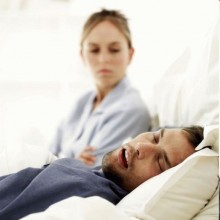 Woman Watching Man Snore